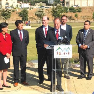Rep. Adam Schiff (at the podium) joined Reps. Judy Chu (from left), Jimmy Gomez and Brad Sherman to support preserving the San Gabriel Mountains as a national monument. (photo by Luke Harold)